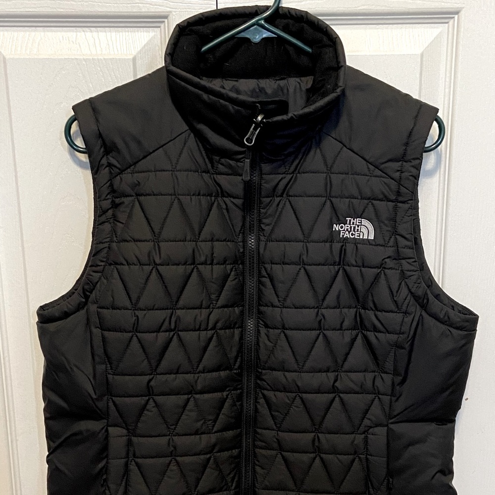 Northface women’s down vest sz L